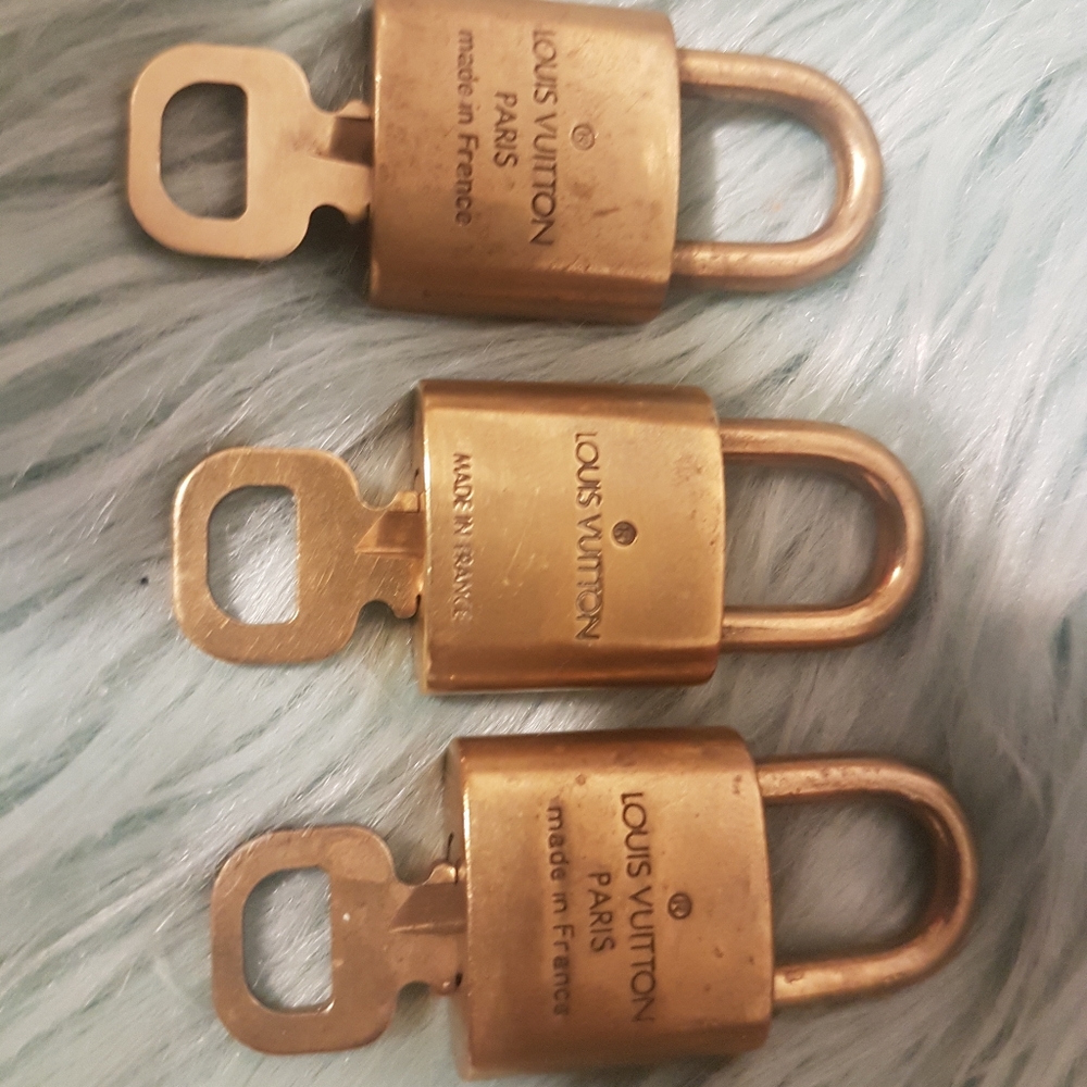 Sold authentic Louis vuitton lock and key lot of 3
